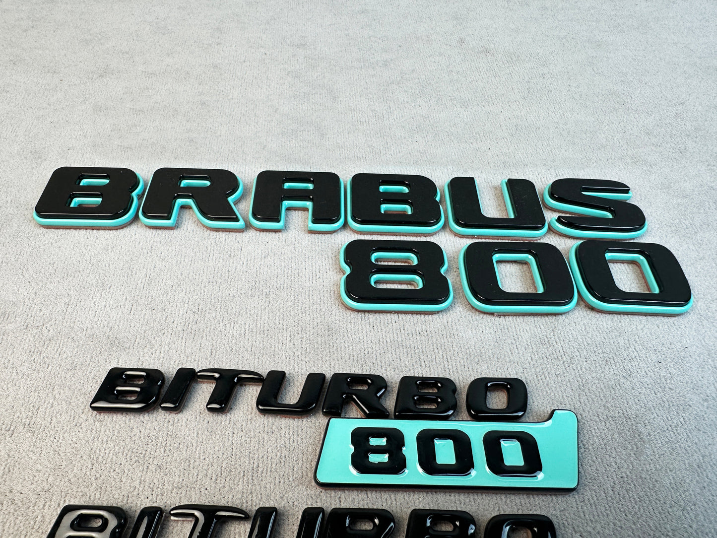 Tiffany Blue Brabus emblems ready for Mercedes customization