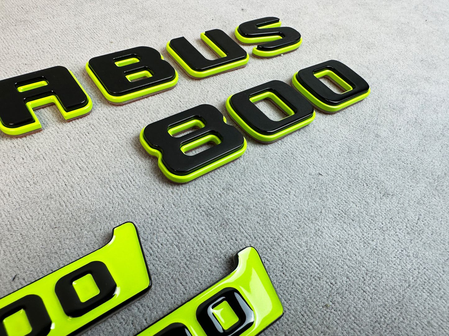 Custom lime green tuning badges set for SUV