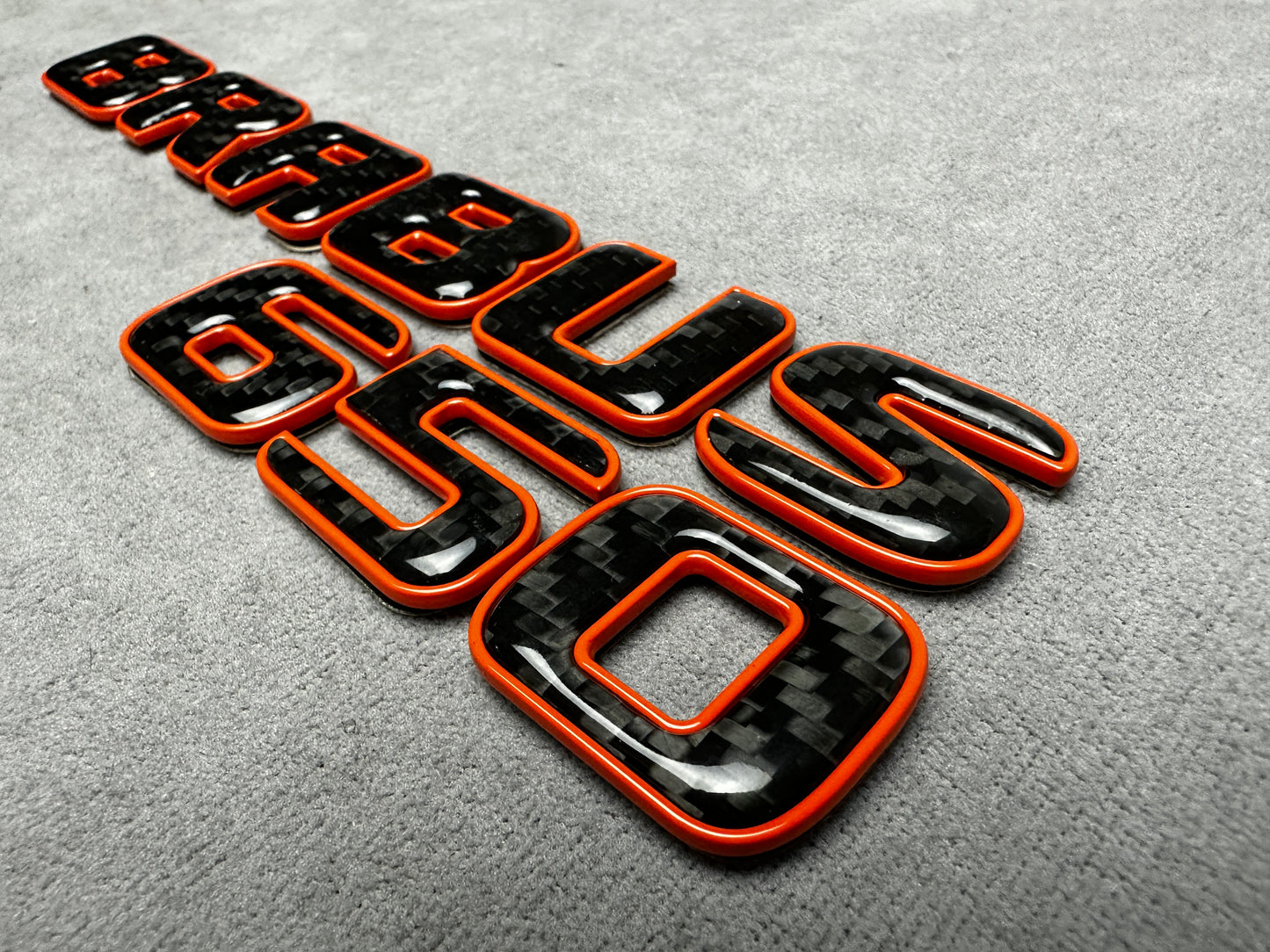 Brabus 650 emblem badge rear trunk 2-component red metallic with genuine carbon for Mercedes, premium design, easy installation.