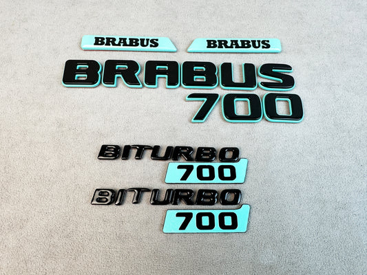 Gloss black Brabus 700 rear trunk badge with Tiffany Blue finish