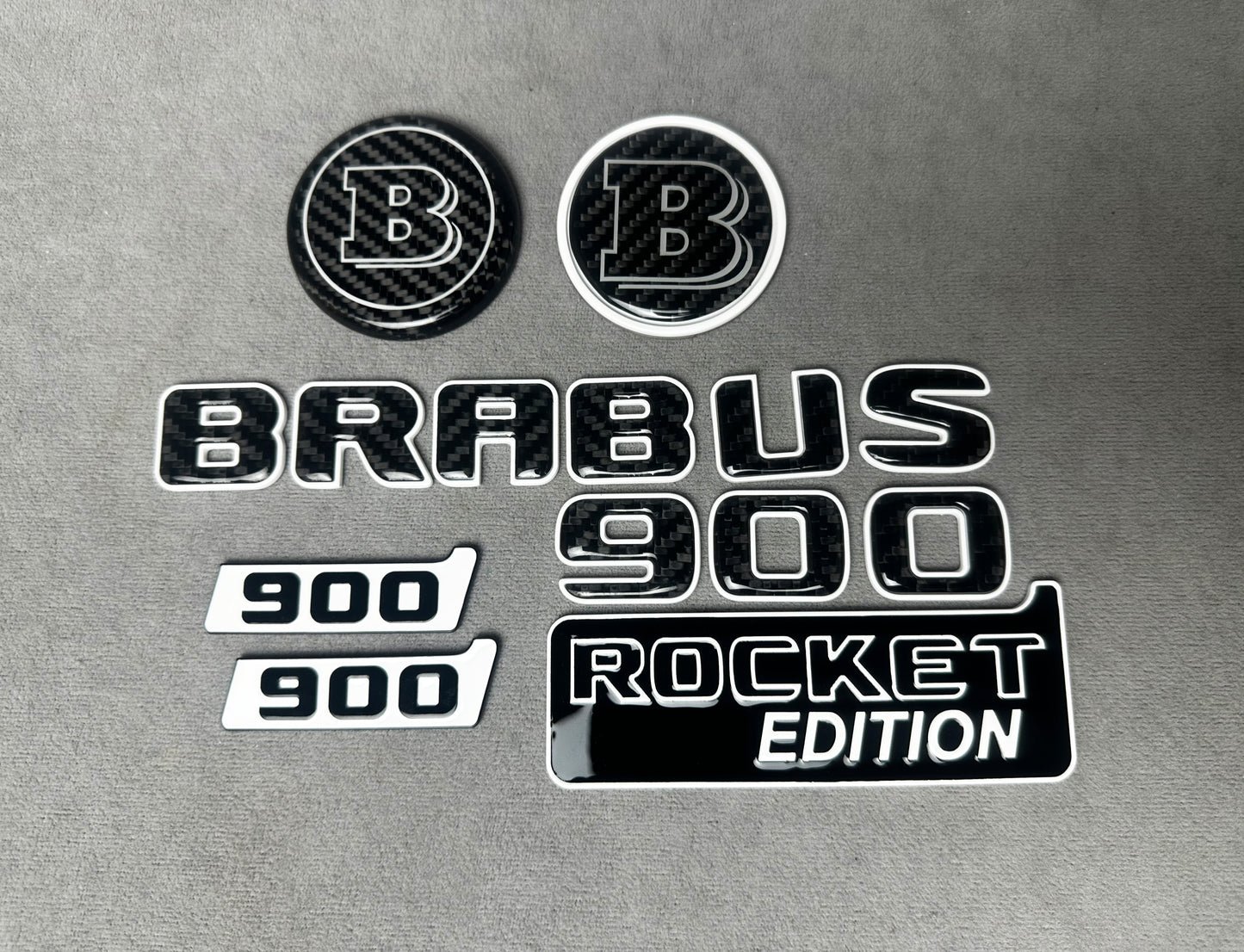 Brabus 900 Rocket Edition White Metal and Carbon Emblem Set for Mercedes W463A – Full set of badges featuring premium white metal and carbon fiber accents