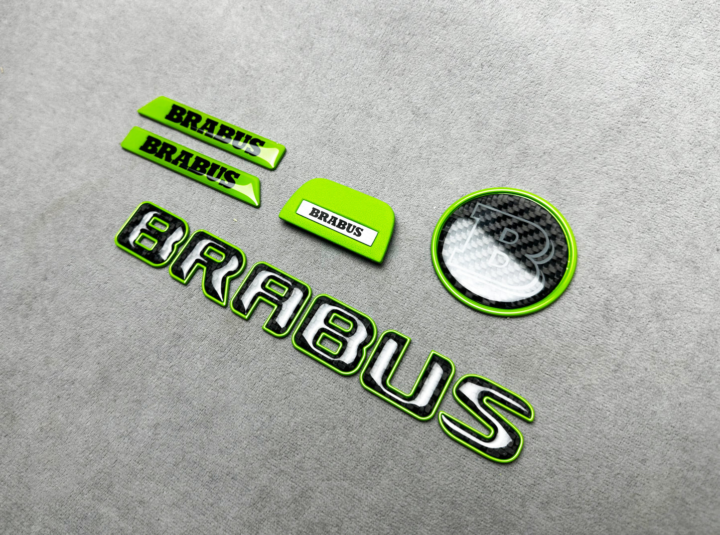 Brabus green emblem badge set with carbon fiber accents for Mercedes W463A, exterior, premium quality