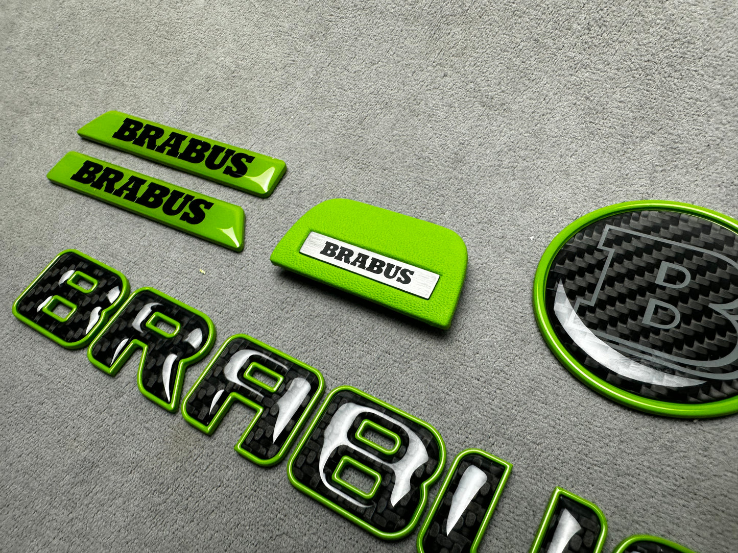 Brabus green emblem badge set with carbon fiber accents for Mercedes W463A, exterior, premium quality