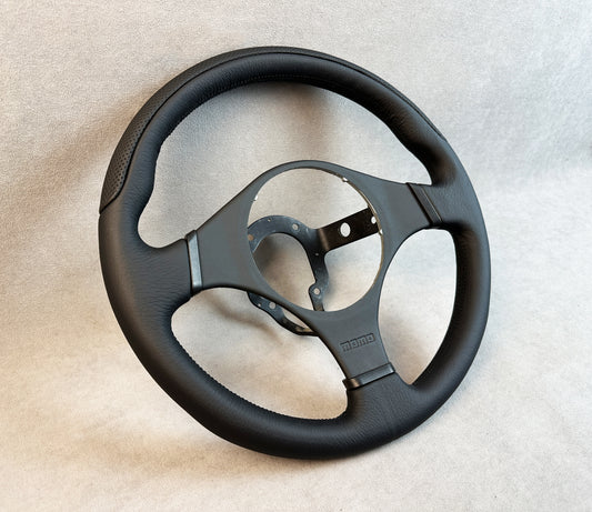 Evo 9 MOMO wheel with new stitched leather and restored grip