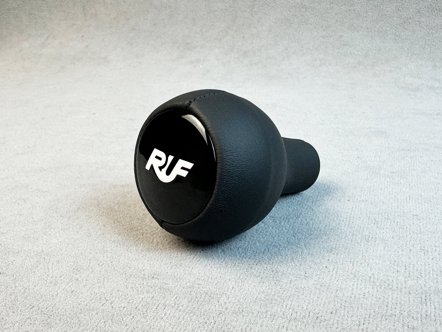 Black leather shift knob for Porsche with white logo insert