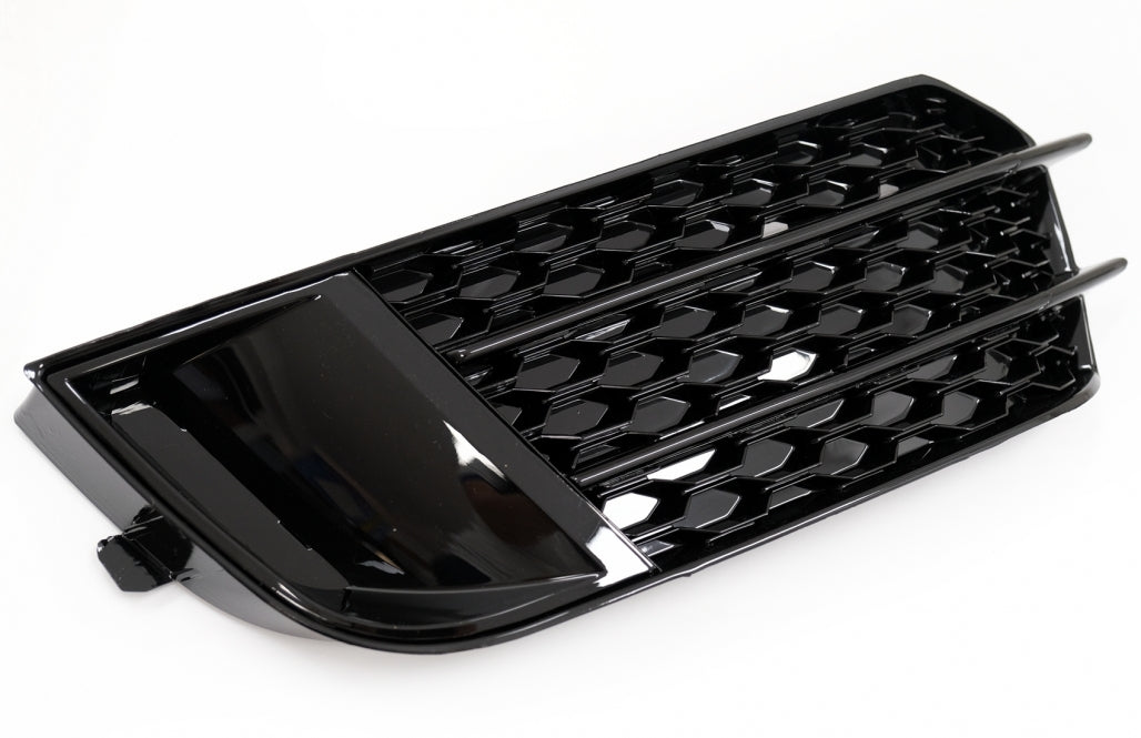 Side Grilles Fog Lamp Covers compatible with Audi A1 8X (2010–2015), RS1 Design in Piano Black, made of high-quality ABS plastic.