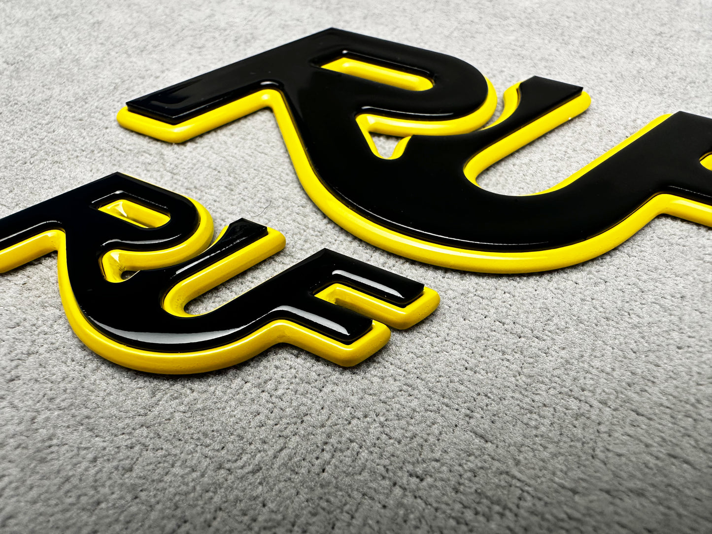 Classic Porsche 964 Turbo with yellow and black RUF metal badge installed