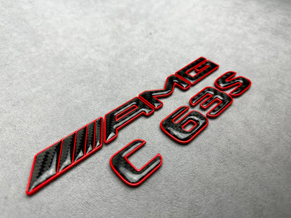 AMG C 63 S red metal with carbon emblem badge for Mercedes C-Class (W204, W205, W206), exterior styling upgrade