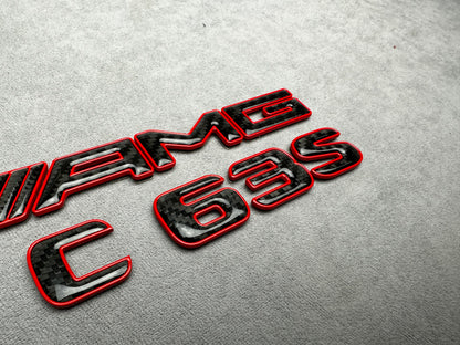 AMG C 63 S red metal with carbon emblem badge for Mercedes C-Class (W204, W205, W206), exterior styling upgrade