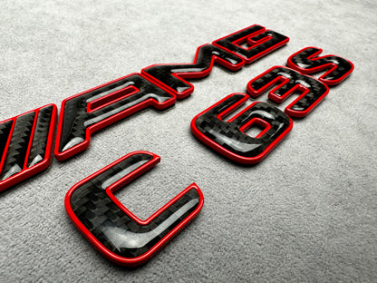 AMG C 63 S red metal with carbon emblem badge for Mercedes C-Class (W204, W205, W206), exterior styling upgrade