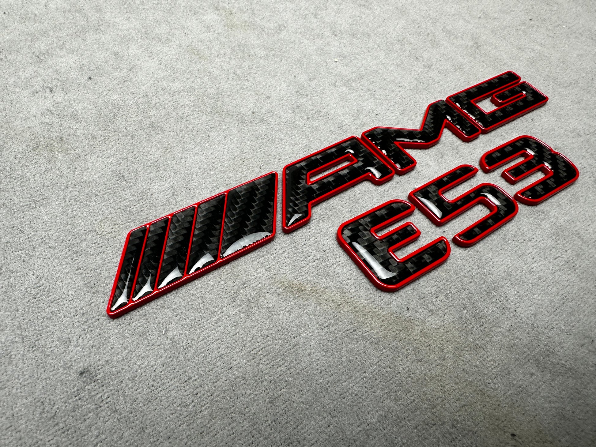 AMG E 53 red metal with carbon emblem badge for Mercedes E-Class trunk, premium quality, easy installation