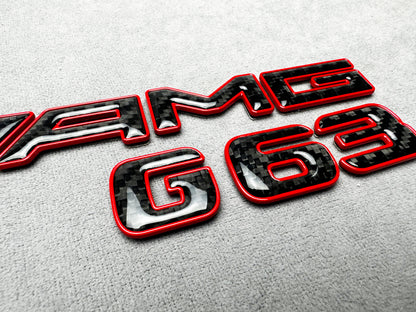 AMG G63 red metallic with carbon emblem badge for Mercedes G-Class W465, premium finish, easy installation