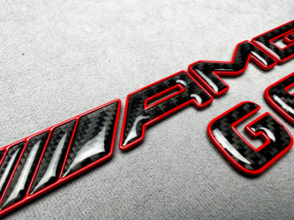 AMG G63 red metallic with carbon emblem badge for Mercedes G-Class W465, premium finish, easy installation