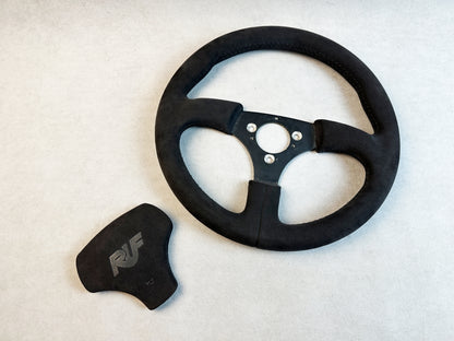 Porsche 964 race-inspired interior with black Alcantara wheel