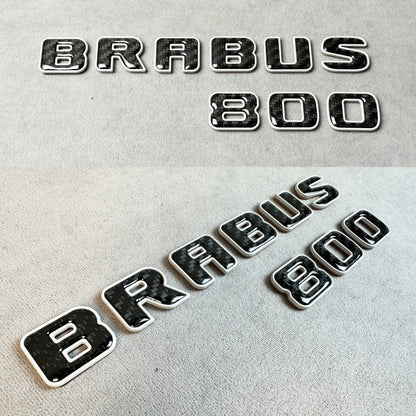 BRABUS 800 emblem with Nardo Grau metal and carbon background