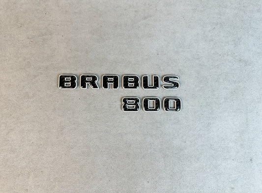 High-detail close-up of carbon BRABUS 800 emblem for Mercedes