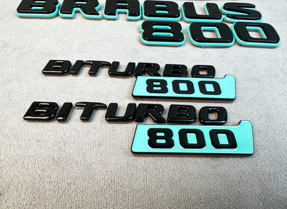 Rear and fender emblems with strong adhesive backing