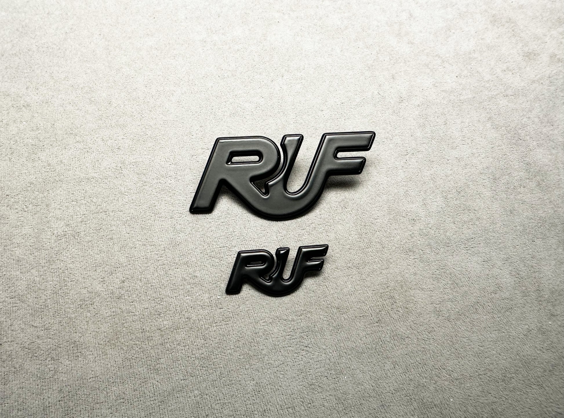 Stylish black RUF emblems for Porsche 911 models – high-performance look