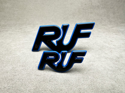 Stylish black and blue RUF emblems for Porsche 911 models – high-performance look