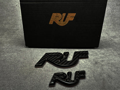 Stylish black with carbon RUF emblems for Porsche 911 models – high-performance look