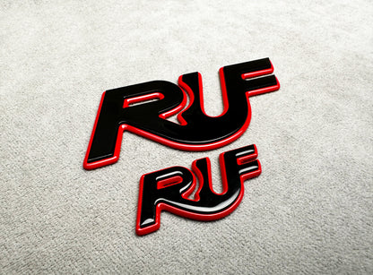 Close-up of black with red RUF badge for Porsche classic models