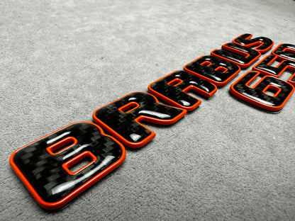 Brabus 650 emblem badge rear trunk 2-component red metallic with genuine carbon for Mercedes, premium design, easy installation.
