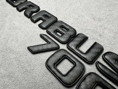 Brabus 700 carbon matte with metal trunk badge emblem for Mercedes, sleek and durable design for high-performance vehicles