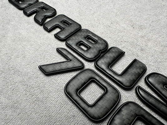 Brabus 700 carbon matte with metal trunk badge emblem for Mercedes, sleek and durable design for high-performance vehicles