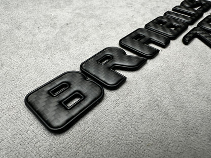 Brabus 700 carbon matte with metal trunk badge emblem for Mercedes, sleek and durable design for high-performance vehicles