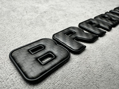 Brabus 700 carbon matte with metal trunk badge emblem for Mercedes, sleek and durable design for high-performance vehicles
