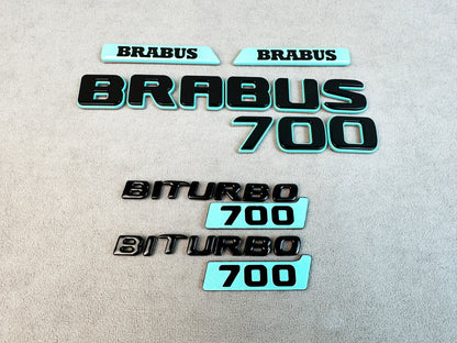 Gloss black Brabus 700 rear trunk badge with Tiffany Blue finish