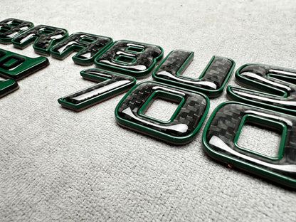 Brabus 700 Mean Green Metal with Carbon Trunk Badge Emblem for Mercedes W465 G-Wagon – premium styling with a high-performance carbon finish