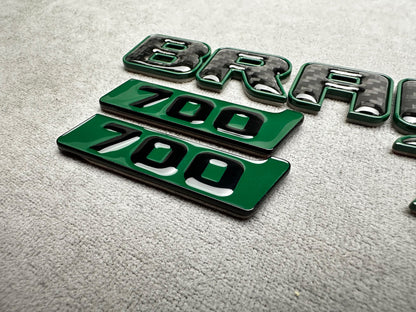 Brabus 700 Mean Green Metal with Carbon Trunk Badge Emblem for Mercedes W465 G-Wagon – premium styling with a high-performance carbon finish