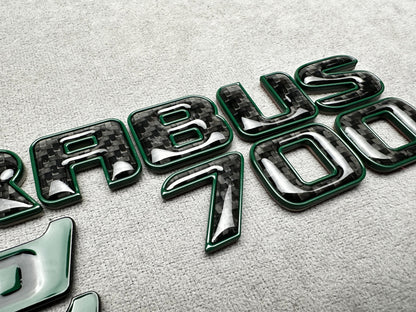 Brabus 700 Mean Green Metal with Carbon Trunk Badge Emblem for Mercedes W465 G-Wagon – premium styling with a high-performance carbon finish