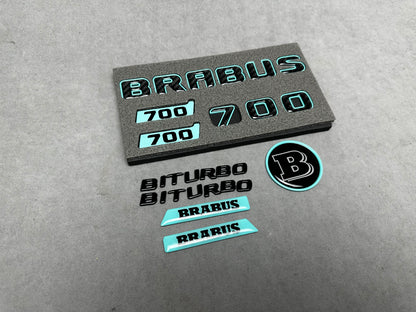 Brabus 700 Tiffany Blue with Carbon exterior emblems set for G-Wagon W463A W465, including trunk, Biturbo side badges, round B for hood, and Brabus insertions