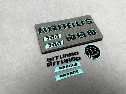 Brabus 700 Tiffany Blue with Carbon exterior emblems set for G-Wagon W463A W465, including trunk, Biturbo side badges, round B for hood, and Brabus insertions