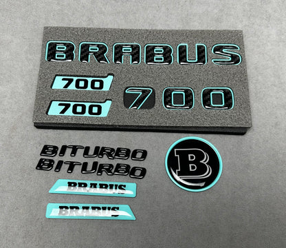 Brabus 700 Tiffany Blue with Carbon exterior emblems set for G-Wagon W463A W465, including trunk, Biturbo side badges, round B for hood, and Brabus insertions