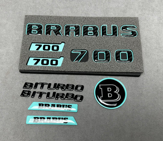 Brabus 700 Tiffany Blue with Carbon exterior emblems set for G-Wagon W463A W465, including trunk, Biturbo side badges, round B for hood, and Brabus insertions