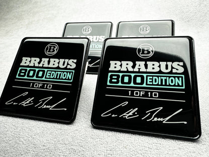 Close-up of Brabus 800 Edition seat emblems with rear bracket fangs for easy installation
