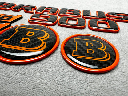 Brabus 900 Orange Metal and Carbon Emblem Set for Mercedes GT – Full badge set featuring premium metallic orange and carbon fiber finish