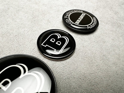 Brabus black AMG emblem set for Mercedes W223 – front, hood, and trunk