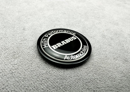 Close-up of Brabus black emblem on the front bumper of a Mercedes S-Class W223