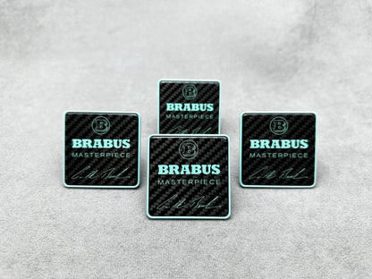 Close-up of Brabus Masterpiece seat emblems with premium carbon and Tiffany blue finish