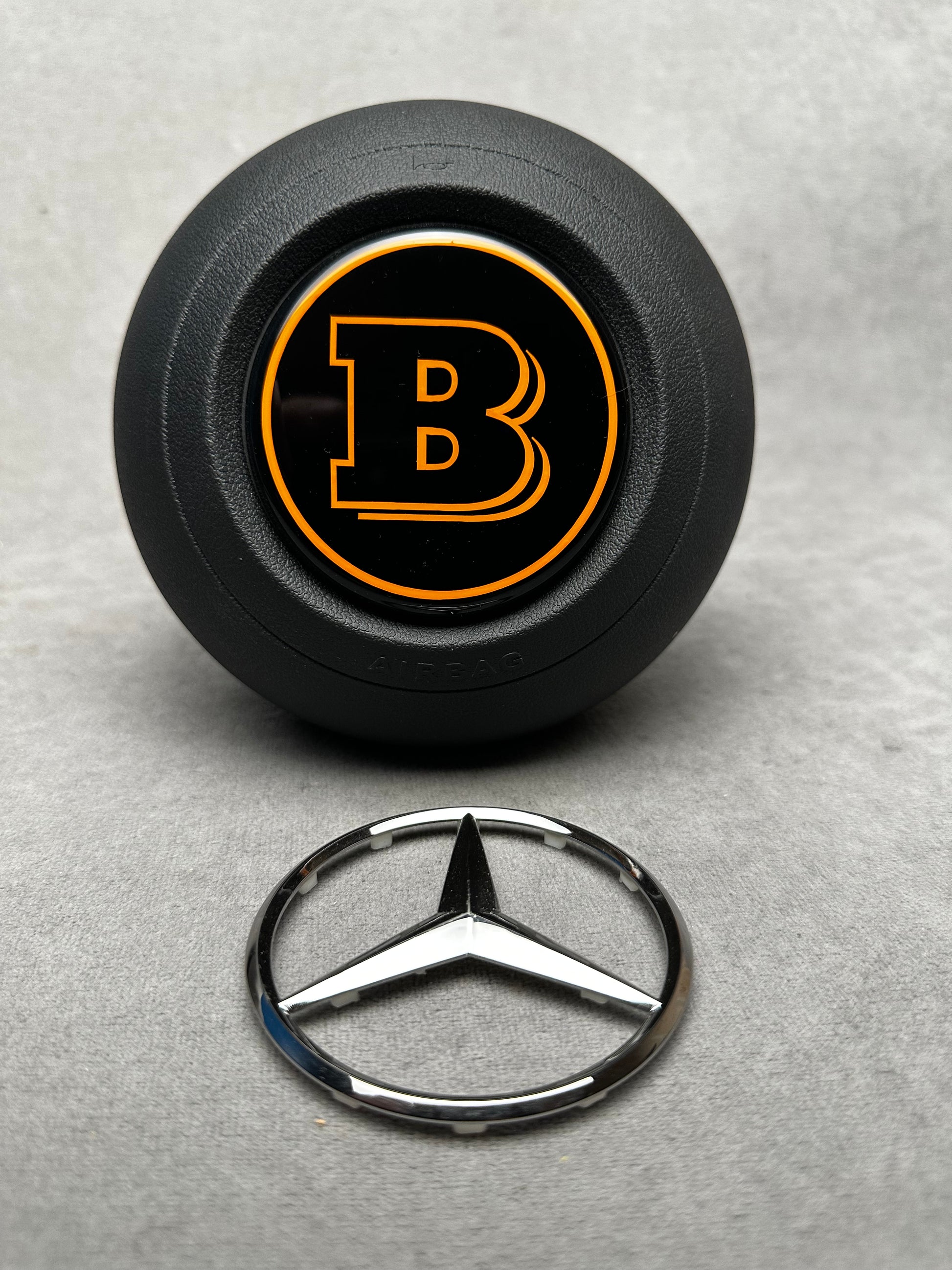 Brabus orange emblem for airbag steering wheel – 2024+ Mercedes G-W465, S-W223, GLE, GLS, premium quality