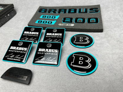 Brabus Blue 800 emblem badges set for Mercedes GT, including trunk, side, seat, steering wheel, and exclusive '1 of 10' aluminum emblem