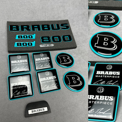 Brabus Blue 800 emblem badges set for Mercedes GT, including trunk, side, seat, steering wheel, and exclusive '1 of 10' aluminum emblem