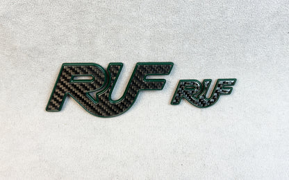 Emblem thickness and carbon texture close-up for Porsche RUF badges