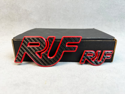 Detailed shot of carbon texture and red anodized RUF lettering