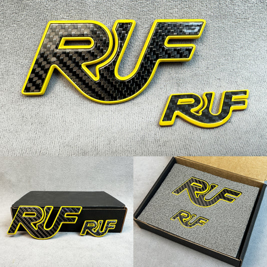 RUF carbon with yellow metal emblem for Porsche 911 Turbo close-up