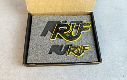Porsche 996 Turbo with custom RUF carbon yellow badge